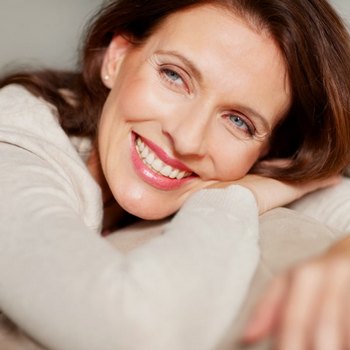 Woman is joyfully smiling